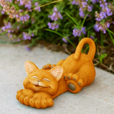 Statue chat roux qui dort