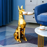 Statue de doberman en or