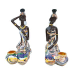 Statue de femme africaine assise