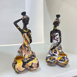 Statue de femme africaine porte-bougie