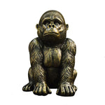Statue de gorille dorée