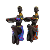 Statue femme africaine porte-bougie