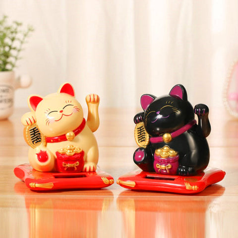 Statues de chat qui bouge