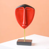 Statue de visage rouge