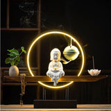 Bouddha en statue lumière zen