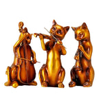 Chat statue musicien