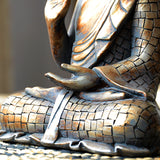 Détails statue de bouddha assis