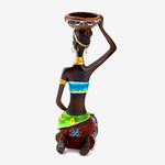 Porte bougie femme africaine statue