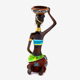 Porte bougie femme africaine statue