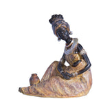 Statue africaine femme assise