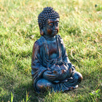 Statue bouddha assis lumineux