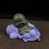 Statue Bouddha bébé robe violette