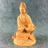 Statue Bouddha en bois sculpté