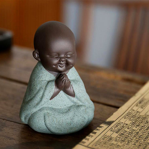 Statue Bouddha enfant noir