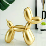 Statue chien ballon doré