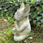 Statue chien zen méditation