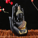 Statue de bouddha noir main levée