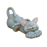 Statue de chat allongé