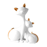 Statue de chat blanc