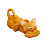 Statue de chat roux qui dort