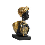 Statue de femme africaine or