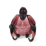 Statue de gorille en verre rose