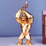 Statue dorée de gorille décoration