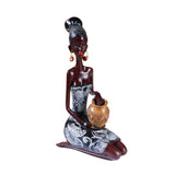 Statue femme africaine assise