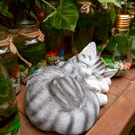 chat qui dort statue mignon