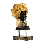 femme en statue africaine