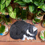 statue de chat endormie